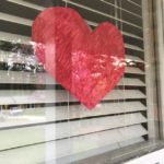A heart shape in the window signals empathy to passersby.